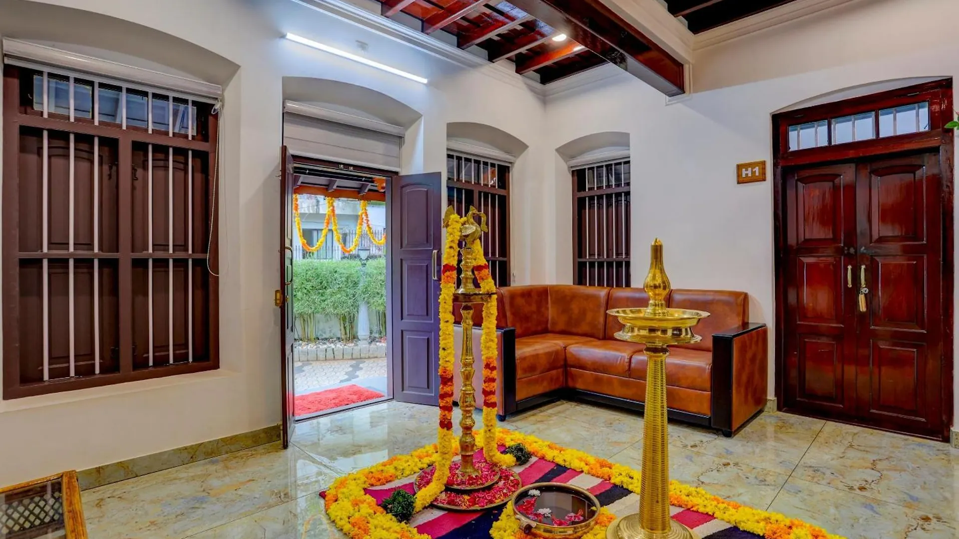 Hotel O Poptavern Heritage Kovalam